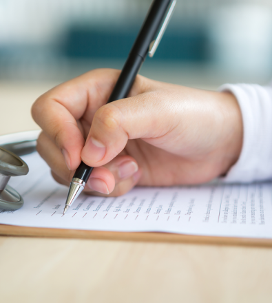 hand-with-pen-filling-out-document 1